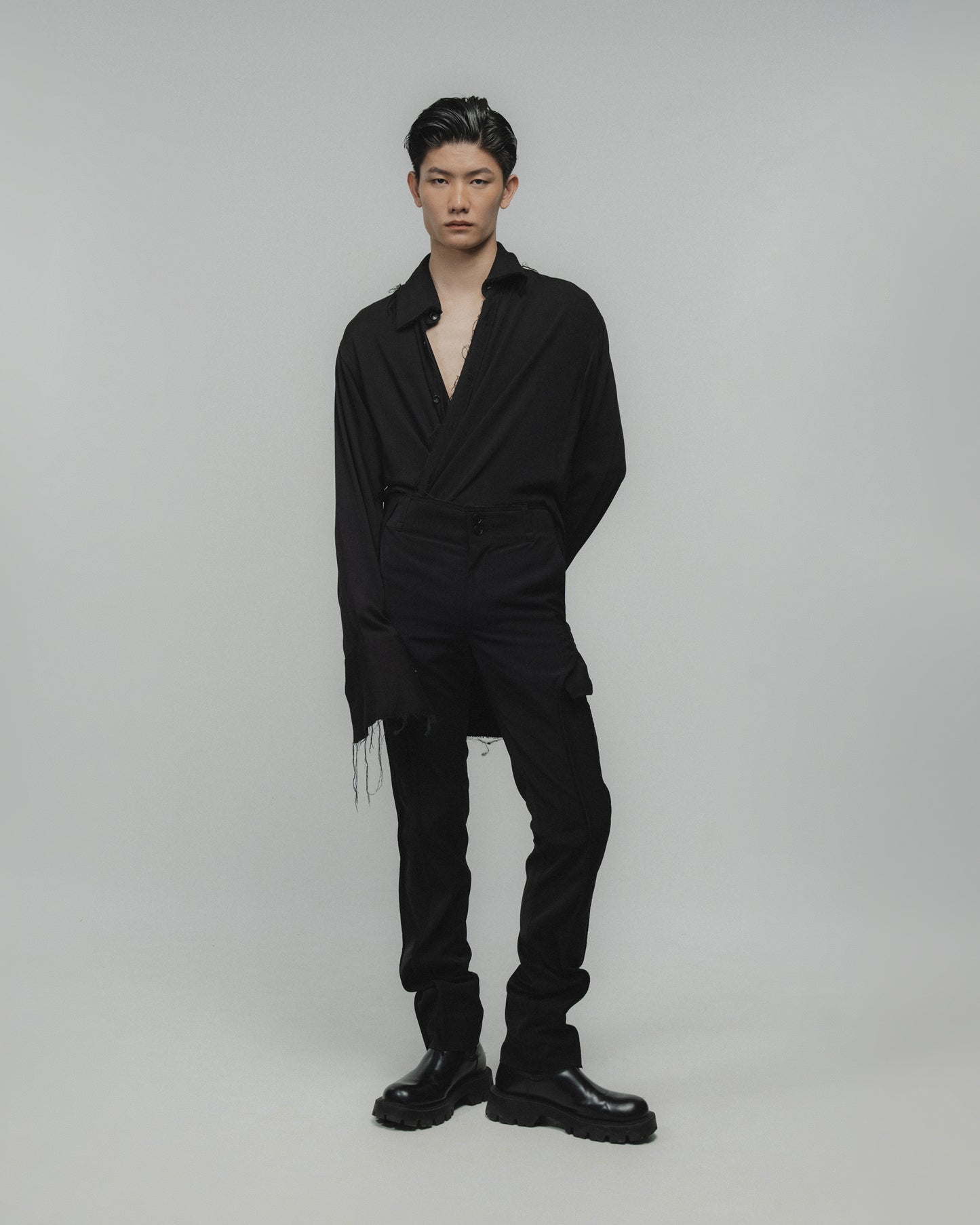 TAPERED EXPOSED POCKET TAILORED TROUSERS